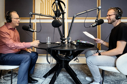 Two hosts podcast interview